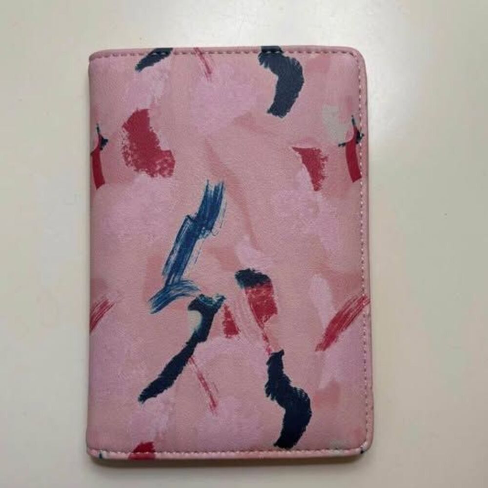 Ivoryella passport holder